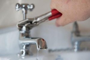 fixing-leaking-tap-497x373